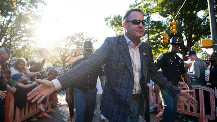 Former Auburn Tigers head coach Hugh Freeze greets fans during Tiger Walk before Auburn Tigers take on Kentucky Wildcats in Auburn, Ala. on Saturday, Nov. 1, 2025.