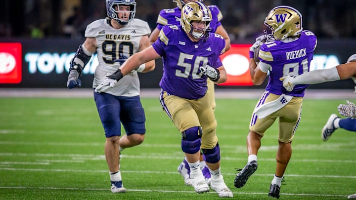 Carver Willis (50) is shown in healthier times for the UW football team.