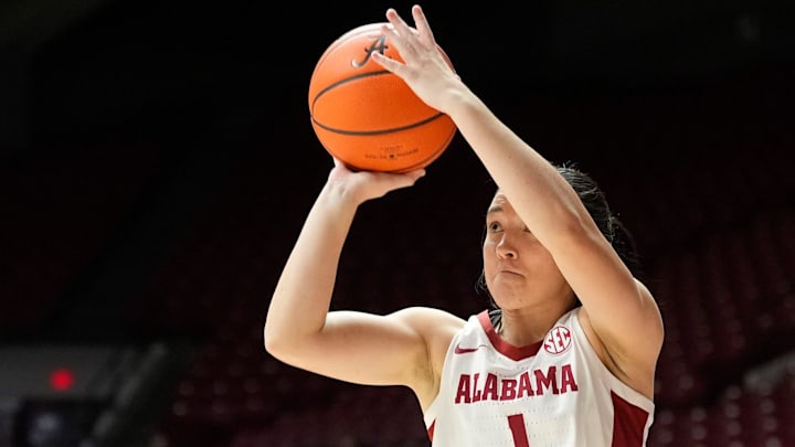 Dec 17, 2025; Tuscaloosa, AL, USA; Alabama guard Ace Austin (1) takes a three point shot against Tulane at Coleman Coliseum. Mandatory Credit: Gary Cosby Jr.-Tuscaloosa News