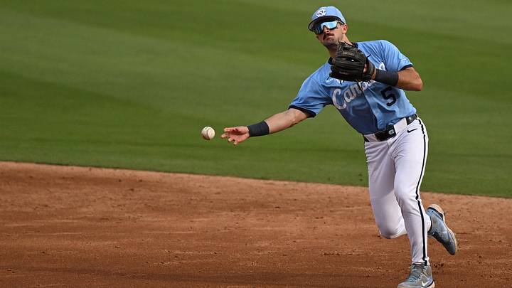 May 30, 2026; Chapel Hill, NC, USA; North Carolina Tar Heels infielder Gavin Gallaher (5) throws to first during game 4 of the Chapel Hill Regional at Boshamer Stadium. Mandatory Credit: William Howard-Imagn Images