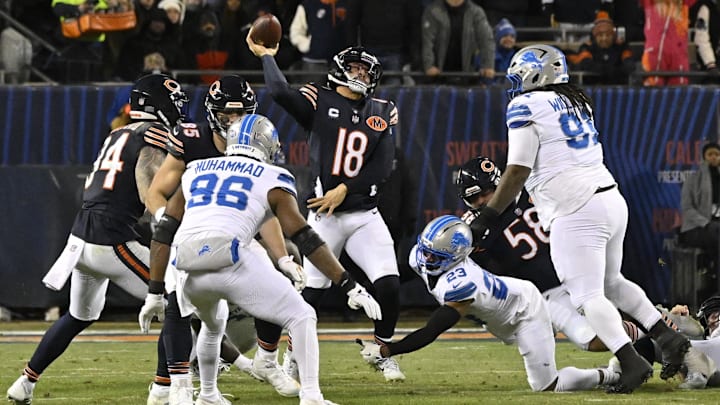 Caleb Williams gets off a pass under heavy Detroit rush in the second half Sunday.