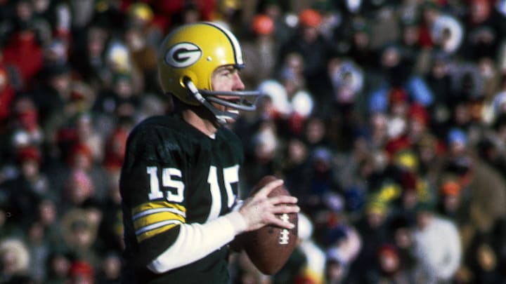 Green Bay Packers quarterback Bart Starr (15) in action against the Dallas Cowboys in the Ice Bowl.