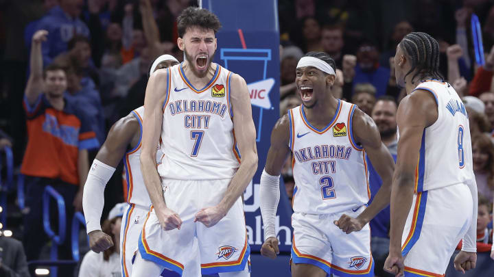 Dec 8, 2023; Oklahoma City, Oklahoma, USA; Oklahoma City Thunder forward Chet Holmgren (7), and guard Shai Gilgeous-Alexander (2) celebrate after Chet Holmgren scores a basket against the Golden State Warriors during the second half at Paycom Center. Mandatory Credit: Alonzo Adams-USA TODAY Sports Dec 8, 2023; Oklahoma City, Oklahoma, USA; Oklahoma City Thunder forward Chet Holmgren (7), and guard Shai Gilgeous-Alexander (2) celebrate after Chet Holmgren scores a basket against the Golden State Warriors during the second half at Paycom Center. Mandatory Credit: Alonzo Adams-USA TODAY Sports