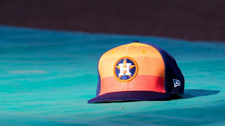 Apr 9, 2024; Kansas City, Missouri, USA; A general view of Houston Astros second base Jose Altuve (27) hat on the field during batting practice prior to a game against the Kansas City Royals at Kauffman Stadium. Mandatory Credit: Denny Medley-Imagn Images