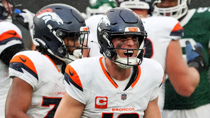 Sep 29, 2024; East Rutherford, New Jersey, USA;  Denver Broncos quarterback Bo Nix (10) celebrates the win over against the New York Jets at MetLife Stadium. Mandatory Credit: Robert Deutsch-Imagn Images