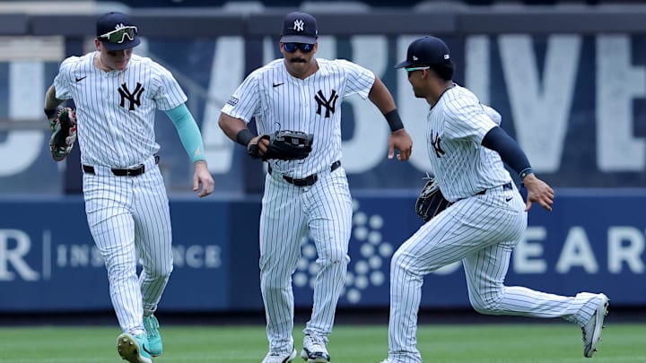 Aug 3, 2024; Bronx, New York, USA; New York Yankees left fielder Alex Verdugo (24) and center fielder Trent Grisham (12) and right fielder Juan Soto (22) celebrate after defeating the Toronto Blue Jays at Yankee Stadium. Mandatory Credit: Brad Penner-Imagn Images Aug 3, 2024; Bronx, New York, USA; New York Yankees left fielder Alex Verdugo (24) and center fielder Trent Grisham (12) and right fielder Juan Soto (22) celebrate after defeating the Toronto Blue Jays at Yankee Stadium. Mandatory Credit: Brad Penner-Imagn Images