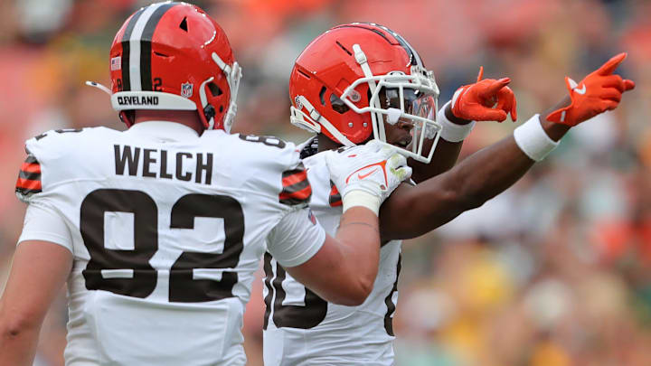 Cleveland Browns wide receiver Jamari Thrash (80) celebrates a first-down catch with Cleveland Browns tight end Treyton Welch (82) during the second half of an NFL preseason football game at Cleveland Browns Stadium,