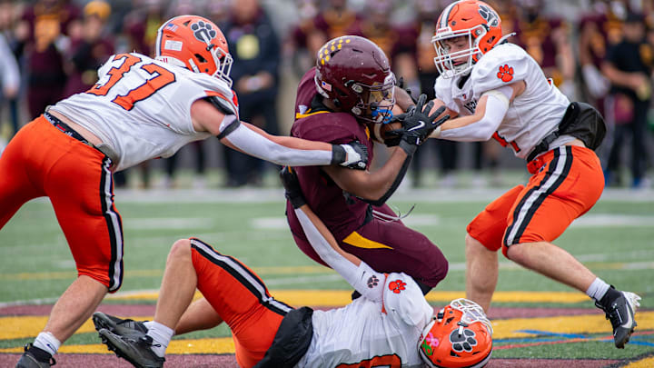 Byron tackles Montini Catholic during the second quarter of the Round 2 playoff game in Lombard on Saturday, Nov. 9, 2024..