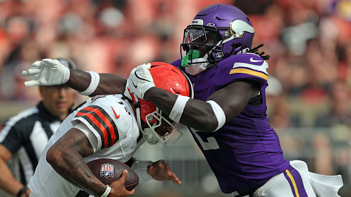 Cleveland Browns quarterback Dorian Thompson-Robinson (17) is sacked by Minnesota Vikings linebacker Brian Asamoah II (2) during the first half of an NFL preseason football game at Cleveland Browns Stadium, Saturday, Aug. 17, 2024, in Cleveland, Ohio.