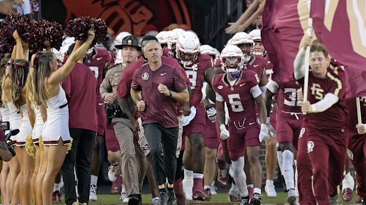 Sep 21, 2024; Tallahassee, Florida, USA; Florida State Seminoles head coach Mike Norvell leads his team out of the tunnel before the game against the California Golden Bears at Doak S. Campbell Stadium. Mandatory Credit: Melina Myers-Imagn Images
