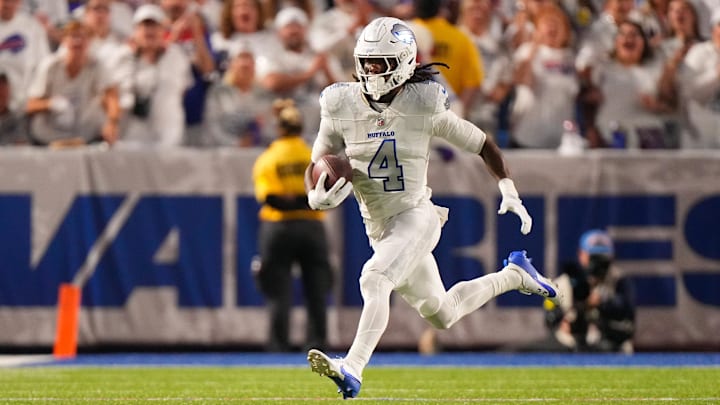 Oct 5, 2025; Orchard Park, New York, USA; Buffalo Bills running back James Cook (4) runs with the ball against the New England Patriots Oct 5, 2025; Orchard Park, New York, USA; Buffalo Bills running back James Cook (4) runs with the ball against the New England Patriots