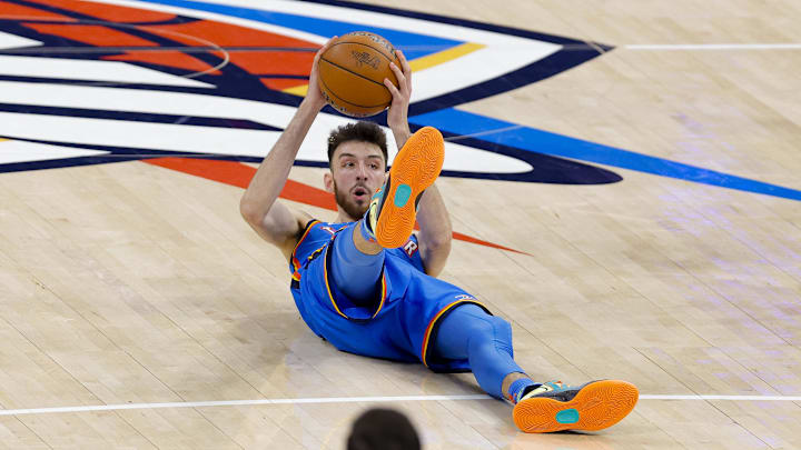 Oklahoma City Thunder forward Chet Holmgren (7) grabs the loose ball against the Indiana Pacers during the second quarter of game two of the 2025 NBA Finals at Paycom Center. Oklahoma City Thunder forward Chet Holmgren (7) grabs the loose ball against the Indiana Pacers during the second quarter of game two of the 2025 NBA Finals at Paycom Center.