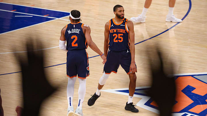 May 12, 2025; New York, New York, USA; New York Knicks forward Mikal Bridges (25) and guard Miles McBride (2) celebrates after a basket in the second half during game four of the second round for the 2025 NBA Playoffs against the Boston Celtics at Madison Square Garden. Mandatory Credit: Vincent Carchietta-Imagn Images