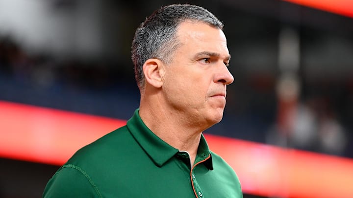 Nov 30, 2024; Syracuse, New York, USA; Miami Hurricanes head coach Mario Cristobal looks on prior to the game against the Syracuse Orange at the JMA Wireless Dome. Mandatory Credit: Rich Barnes-Imagn Images