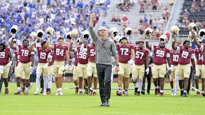 Sep 14, 2024; Tallahassee, Florida, USA; Florida State Seminoles head coach Mike Norvell leads his team before a game against the Memphis Tigers at Doak S. Campbell Stadium. Mandatory Credit: Melina Myers-Imagn Images