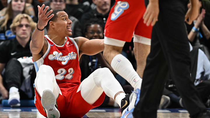 Apr 5, 2025; Detroit, Michigan, USA;  Memphis Grizzlies guard Desmond Bane (22) argues with the officials that he was fouled in the act of shooting against the Detroit Pistons in the second quarter at Little Caesars Arena. Mandatory Credit: Lon Horwedel-Imagn Images