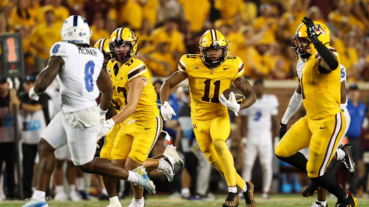 Aug 28, 2025; Minneapolis, Minnesota, USA; Minnesota Golden Gophers wide receiver Javon Tracy (11) runs after a catch against the Buffalo Bulls during the second half of the game at Huntington Bank Stadium. Mandatory Credit: Matt Krohn-Imagn Images