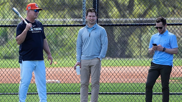 From left, manager A.J. Hinch, talks to president of baseball operation Scott Harris and general manager Jeff Greenberg during spring training at TigerTown in Lakeland, Fla. on Saturday, Feb. 15, 2025.