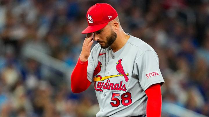 Jul 31, 2026; Toronto, Ontario, CAN;  St. Louis Cardinals pitcher Peter Strzelecki (58) rubs his forehead after being relived during the eighth inning against the Toronto Blue Jays at Rogers Centre. Mandatory Credit: Kevin Sousa-Imagn Images