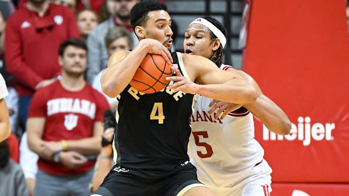 Purdue forward Trey Kaufman-Renn (4) is stopped by Indiana's Malik Reneau (5) on a drive to the basket on Sunday at Assembly Hall.