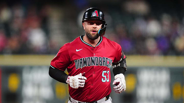 Sep 17, 2024; Denver, Colorado, USA; Arizona Diamondbacks first base Christian Walker (53) runs off a solo home run in the eighth inning against the Colorado Rockies at Coors Field. Mandatory Credit: Ron Chenoy-Imagn Images