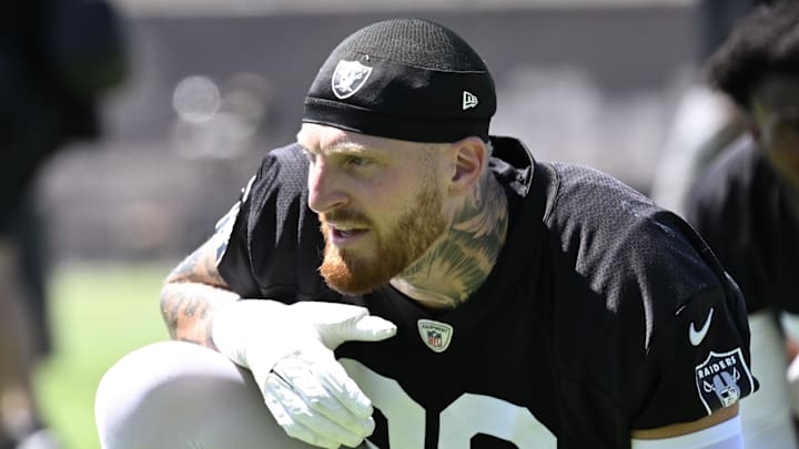 Jun 10, 2025; Henderson, NV, USA; Las Vegas Raiders defensive end Maxx Crosby (98) looks on during the team stretch during Las Vegas Raiders Minicamp at Intermountain Health Performance Center. Mandatory Credit: Candice Ward-Imagn Images