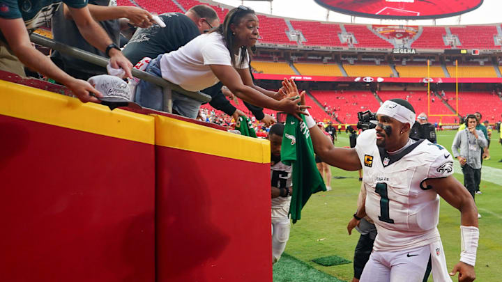 Sep 14, 2025; Kansas City, Missouri, USA; Philadelphia Eagles quarterback Jalen Hurts (1) runs off the field after the game against the Kansas City Chiefs at GEHA Field at Arrowhead Stadium. Mandatory Credit: Denny Medley-Imagn Images