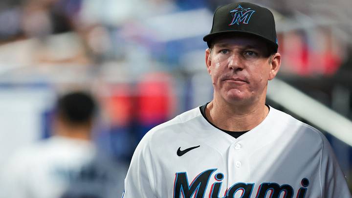 Miami Marlins manager Clayton McCullough (86) looks on from inside the dugout. Miami Marlins manager Clayton McCullough (86) looks on from inside the dugout.