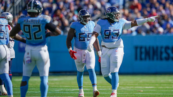 Tennessee Titans defensive tackle T'Vondre Sweat (93) celebrates sacking New England Patriots quarterback Drake Maye (10) during the fourth quarter at Nissan Stadium in Nashville, Tenn., Sunday, Oct. 19, 2025.
