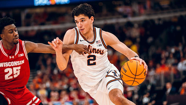 Illinois wing Andrej Stojakovic (2) drives on Wisconsin's John Blackwell (25) in the Illini's 91-88 overtime loss to the Badgers in last week's Big Ten Tournament quarterfinals at the United Center in Chicago.