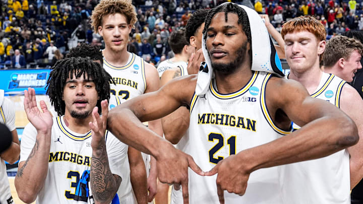 Michigan forward Morez Johnson Jr. poses for a photo after 101-80 win over Howard at the NCAA Tournament First Round