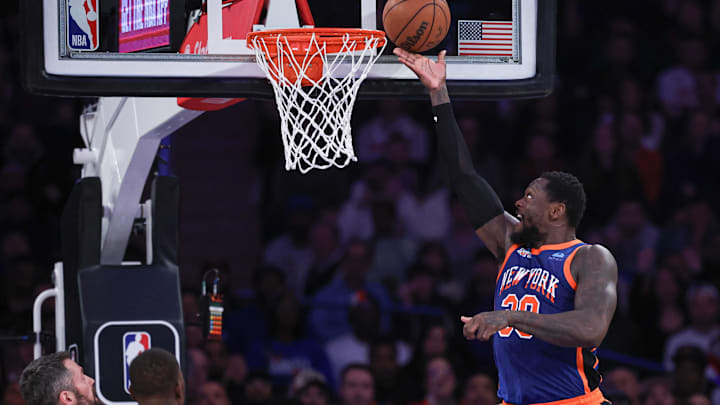 Jan 27, 2024; New York, New York, USA; New York Knicks forward Julius Randle (30) lays the ball up during the first half against the Miami Heat cat Madison Square Garden. Mandatory Credit: Vincent Carchietta-Imagn Images
