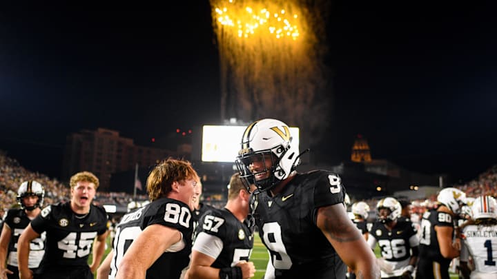 Nov 8, 2025; Nashville, Tennessee, USA;  Vanderbilt Commodores wide receiver Claiborne Richards (80) and tight end Eli Stowers (9) celebrates the win over Auburn Tigers during the overtime period at FirstBank Stadium. Mandatory Credit: Steve Roberts-Imagn Images