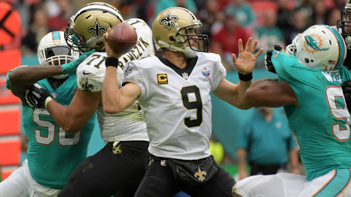 New Orleans Saints quarterback Drew Brees (9) throws a pass against the Miami Dolphins during the NFL International Series game at Wembley Stadium on 2017.