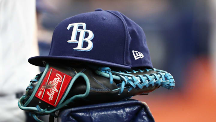 Sep 6, 2019; St. Petersburg, FL, USA; A detail view of a Tampa Bay Rays hat and glove at Tropicana Field. Mandatory Credit: Kim Klement-Imagn Images