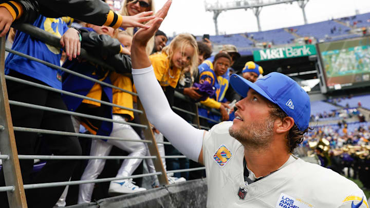 Oct 12, 2025; Baltimore, Maryland, USA; Los Angeles Rams quarterback Matthew Stafford (9) greets his family after the game against the Baltimore Ravens at M&T Bank Stadium. Mandatory Credit: Peter Casey-Imagn Images Oct 12, 2025; Baltimore, Maryland, USA; Los Angeles Rams quarterback Matthew Stafford (9) greets his family after the game against the Baltimore Ravens at M&T Bank Stadium. Mandatory Credit: Peter Casey-Imagn Images