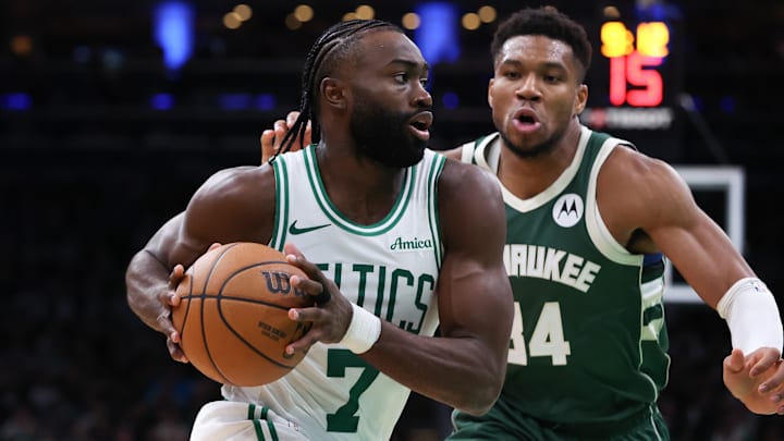 Oct 28, 2024; Boston, Massachusetts, USA; Boston Celtics forward Jaylen Brown (7) drives to the basket defended by Milwaukee Bucks forward Giannis Antetokounmpo (34) during the second half at TD Garden. Mandatory Credit: Paul Rutherford-Imagn Images