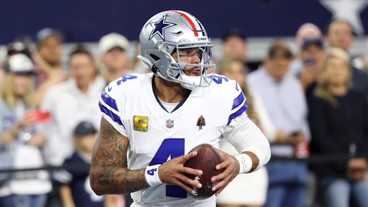 Dallas Cowboys quarterback Dak Prescott (4) warms up before the game against the Arizona Cardinals at AT&T Stadium. 