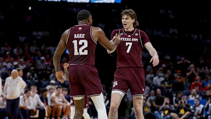 Texas A&M Aggies forward Rashaun Agee celebrates with forward Zach Clemence during a first-round game of the men's 2026 NCAA Tournament at Paycom Center. Mandatory Credit: Alonzo Adams-Imagn Images