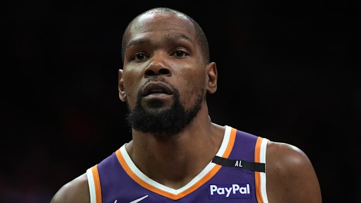 Mar 26, 2025; Phoenix, Arizona, USA; Phoenix Suns forward Kevin Durant (35) looks on against the Boston Celtics during the second half at Footprint Center. Mandatory Credit: Rick Scuteri-Imagn Images