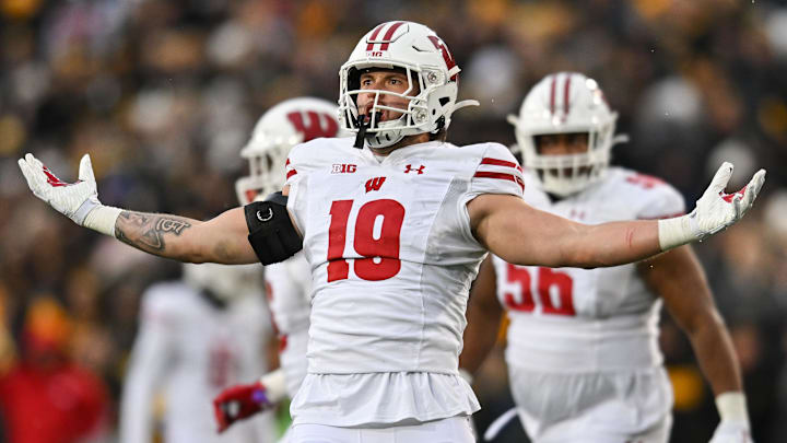Nov 12, 2022; Iowa City, Iowa, USA; Wisconsin Badgers linebacker Nick Herbig (19) reacts after a sack against the Iowa Hawkeyes during the second quarter at Kinnick Stadium. 