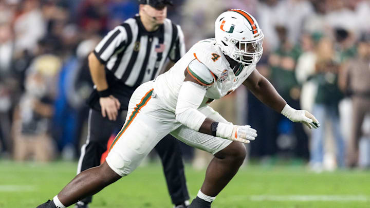 Jan 8, 2026; Glendale, AZ, USA; Miami Hurricanes defensive lineman Rueben Bain Jr. (4) against the Mississippi Rebels during the 2026 Fiesta Bowl and semifinal game of the College Football Playoff at State Farm Stadium. Mandatory Credit: Mark J. Rebilas-Imagn Images