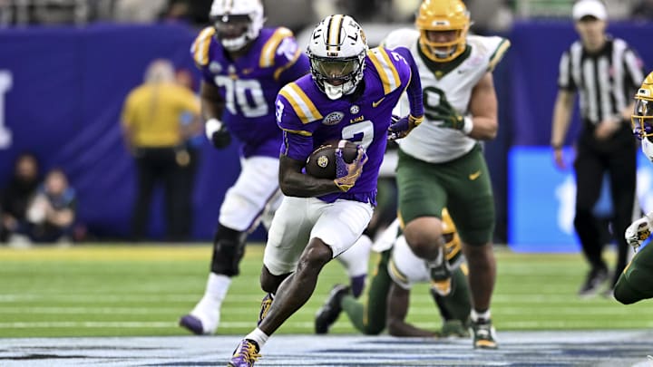 Dec 31, 2024; Houston, TX, USA; LSU Tigers wide receiver Chris Hilton Jr. (3) runs the ball during the first half against the Baylor Bears at NRG Stadium. Mandatory Credit: Maria Lysaker-Imagn Images 