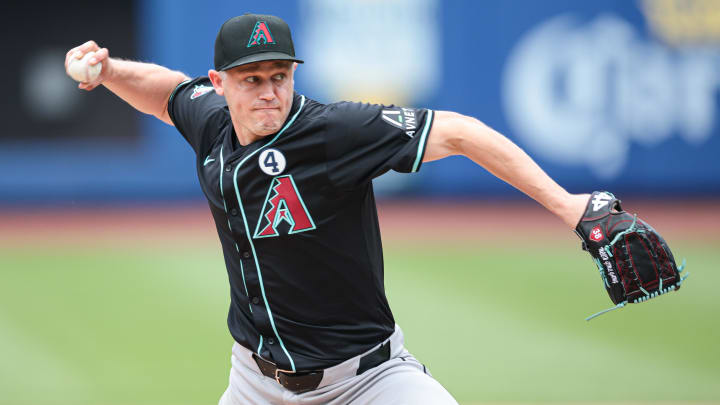 Jun 2, 2024; New York City, New York, USA; Arizona Diamondbacks relief pitcher Paul Sewald (38) delivers a pitch during the ninth inning against the New York Mets at Citi Field. Mandatory Credit: Vincent Carchietta-USA TODAY Sports