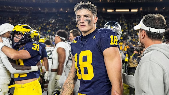 Michigan tight end Colston Loveland (18) walks off the field after 38-17 loss to Oregon at Michigan Stadium in Ann Arbor on Saturday, Nov. 2, 2024.