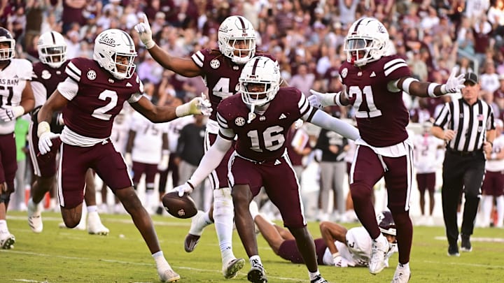 Oct 19, 2024; Starkville, Mississippi, USA; Mississippi State Bulldogs linebacker Zakari Tillman (16) reacts with teammates after an interception against the Texas A&M Aggies during the fourth quarter at Davis Wade Stadium at Scott Field. Mandatory Credit: Matt Bush-Imagn Images