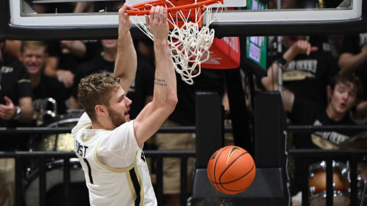 Purdue Boilermakers forward Caleb Furst (1) dunks the ball Purdue Boilermakers forward Caleb Furst (1) dunks the ball