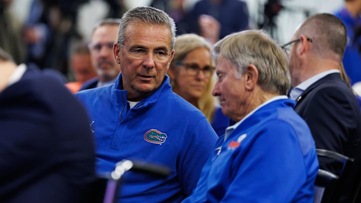 Steve Spurrier, shown here talking with fellow former Florida coach Urban Meyer, had an interesting prediction on one portal QB.