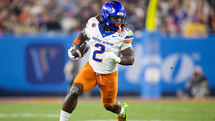 Dec 31, 2024; Glendale, AZ, USA; Boise State Broncos running back Ashton Jeanty (2) against the Penn State Nittany Lions during the Fiesta Bowl at State Farm Stadium. Mandatory Credit: Mark J. Rebilas-Imagn Images