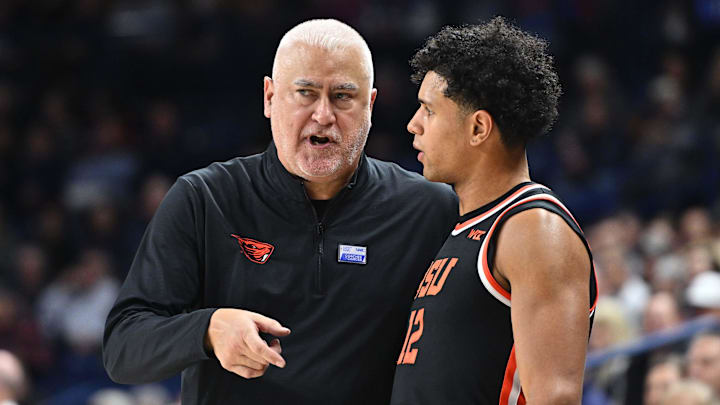 Jan 28, 2025; Spokane, Washington, USA; Oregon State Beavers head coach Wayne Tinkle talks with Oregon State Beavers forward Michael Rataj (12) during a game against the Gonzaga Bulldogs in the second half at McCarthey Athletic Center. Mandatory Credit: James Snook-Imagn Images